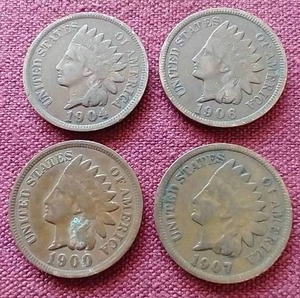 lot 115 image: (4) Indian Pennies
