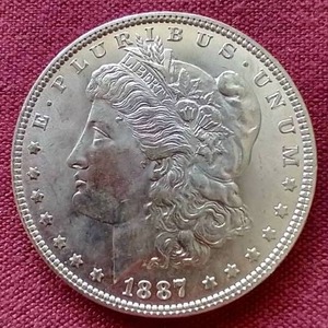 lot 124 image: Gorgeous 1887 Morgan Dollar