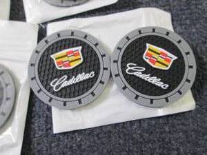 lot 265 image: 6- 2pks Cadillac Car Coasters...