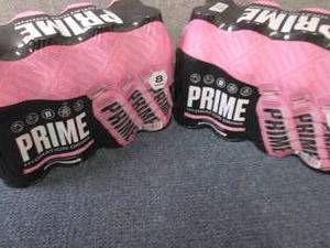 lot 433 image: 2- 8pks 16.9 oz Prime Blue Strawber...