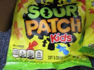lot 566 image: 12- 3.6 oz Sour Patch Kids...