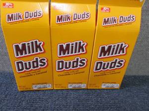 lot 592 image: 3- 10 oz Milk Duds...