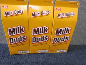 lot 594 image: 3- 10 oz Milk Duds...