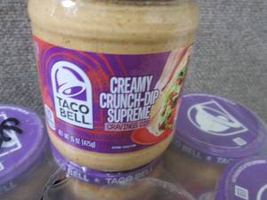 lot 598 image: 16- 15 oz Taco Bell Creamy Crunch-D...