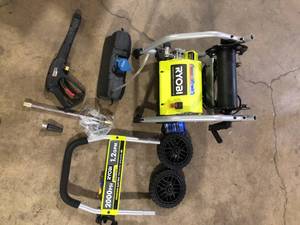 lot 22 image: Ryobi 2000 PSI Pressure Washer Missing Pieces    Customer Returns See Pictures