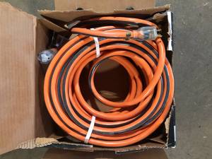 lot 34 image: RIDGID 100 ft. 103 Heavy Duty IndoorOutdoor SJTW Extension Cord with Lighted End, OrangeGrey   Customer Returns See Pictures