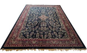 lot 17 image: Large Red and Black Wool Area Rug
