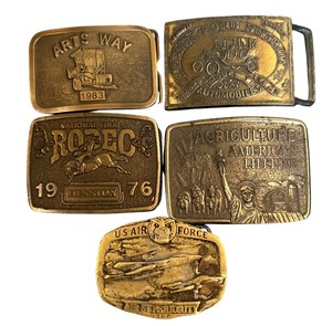 lot 128 image: Bronze Buckles Including Rodeo Nationals Hesston 1976, Farmland Limited Edition Agriculture Lifeline and More