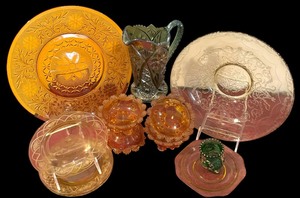 lot 90 image: Antique EAPG Green and Gold Spooner, Footed Glass Amber Dishes, Imperial Carnival Glass Pitcher & More