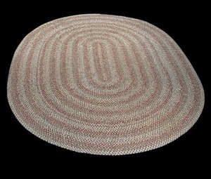 lot 89 image: Large Braided Oval Rug with Blues, Reds and White