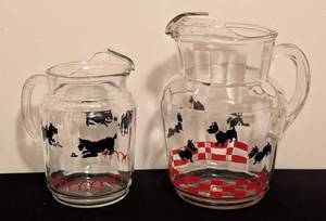 lot 51 image: Pair of Vintage Glass Scottie Dog Pitchers