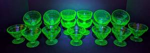 lot 38 image: Anchor Hocking Block Uranium Glass Champagne Glasses