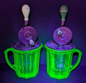 lot 44 image: Pair of Vintage Uranium Glass Hand Mixers
