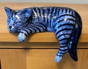 lot 28 image: Delft Sleeping Cat Figurine