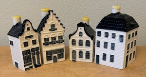 lot 82 image: Four Collectible Delft Houses including Delft House #5, Delft House #12, Delft House #55 and #96