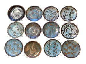 lot 83 image: Twelve Sarah Dudgeon Handcrafted Pottery Plates