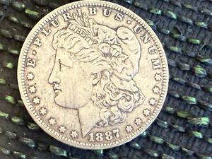 lot 12 image: 1887 O Morgan Dollar