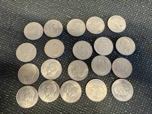 lot 49 image: 20 Ike Dollars