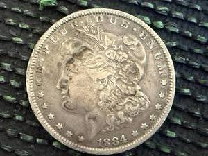 lot 59 image: 1884 Morgan Dollar