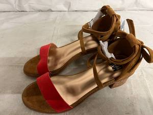 lot 81 image: Pair of Muk Luks Sandals