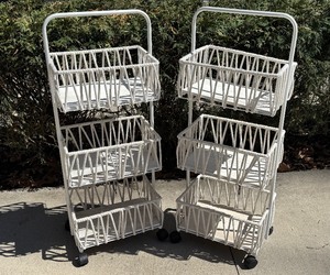lot 57 image: Pair of Decorative Three Tiered Rolling Carts by Becki Owens