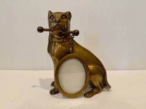 lot 68 image: Vintage Brass Dog Holding Picture Frame