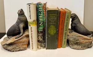 lot 20 image: Set of Vintage Sea Lion Bookends and Books