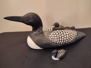 lot 36 image: Resin Loon wBabies