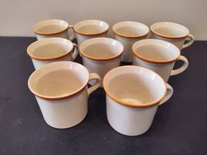 lot 45 image: Set of Nine Stoneware Coffee Mugs