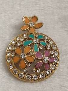 lot 104 image: Nolan Miller Stamped Floral PendantEnhancer
