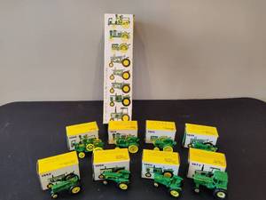 lot 139 image: Vintage Set of Eight John Deer Micro Tractors