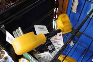 lot 503 image: Camco Power Grip RV Adapter 15A Male to 30A Female