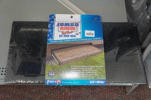 lot 128 image: Jumbo Wraparound RV Step Rug 23 Wide