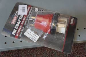 lot 71 image: Mighty Cord RV Adapter 30A Male to 50A Female