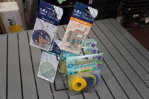 lot 524 image: Camping Themed Car Air Freshners and Citronella Wristbands