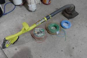 lot 413 image: Ryobi Cordless Trimmer