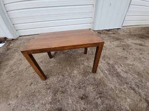 lot 8 image: Solid Wood Dining Table with Natural Finish