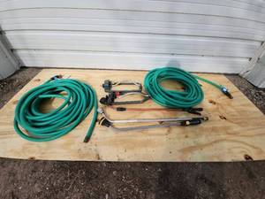 lot 32 image: Set of 2 Garden Hoses with Spray Nozzles and Sprinklers