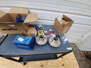 lot 42 image: Kodiak Trailer Hub and Dexter Axle Replacement Parts Bundle