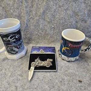 lot 149 image: 2-Chopper Beer Steins and Folding Knife