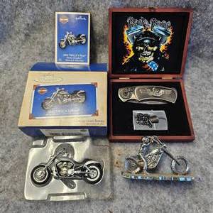 lot 151 image: Hallmark Chopper, Iron Statue, Knife and Zippo Set