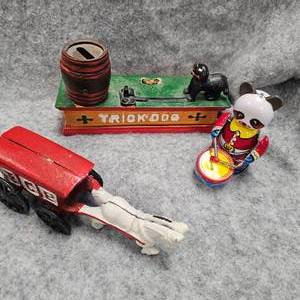 lot 65 image: Cast Iron Toys and Early Tin Drummer Bear