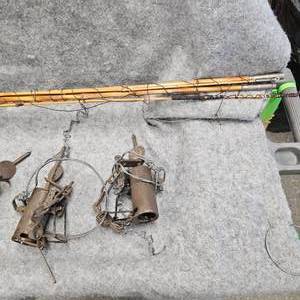 lot 74 image: 4 Foot Hold Traps and 15 Cane Pole