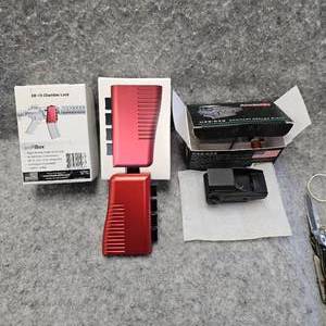 lot 13 image: Aimshot MSG Green Reflex Sight and StopBox AR15 Chamber Lock, Dealer Sample