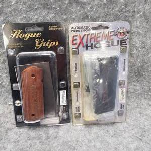 lot 17 image: Hogue-2 Sets 1911 Grips, Gun Smoke Set in Walnut, Weighted Rubber Set, As New, Dealer Sample