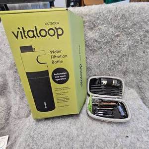 lot 32 image: AR15 Cleaning Kit 22 Caliber and Outdoor Vitaloop Water Filtration Bottle, As New, Dealer Sample
