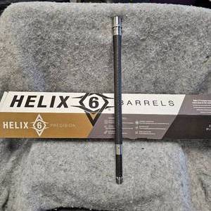 lot 34 image: HELIX 6 AR15 6MM Arc, 18, StainlessCarbbon Fiber Finished Barrel, as New, Dealer Sample