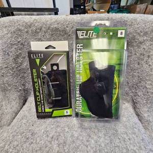 lot 36 image: 2-Elite Holsters, Like New in Box, See Photos for Sizes