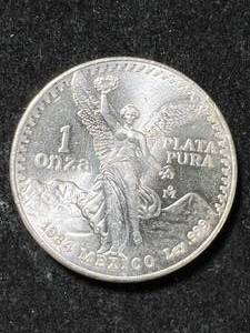 lot 59 image: 1984 MEXICO PLATA PURA 1 TROY OZ .999 FINE SILVER