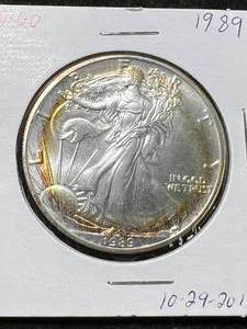 lot 83 image: 1989 AMERICAN SILVER EAGLE 1 TROY OZ .999 FINE SILVER
